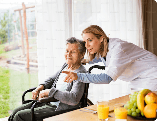 Carer supporting a resident at Josephs Care Home